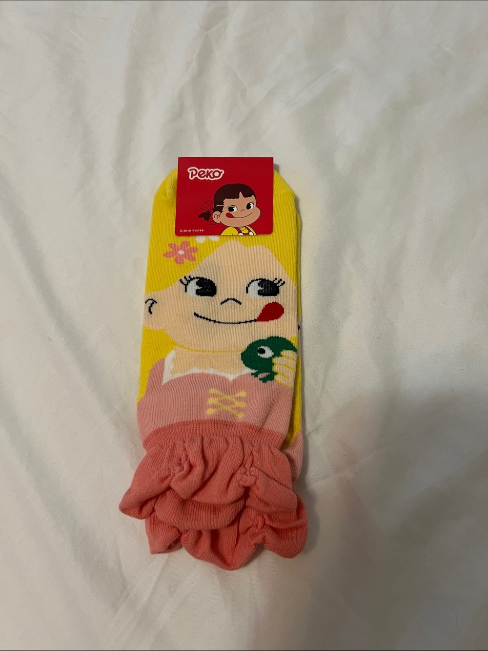 Amazon Peko Rapunzel Character Ruffle Ankle Socks in Yellow and Pink
